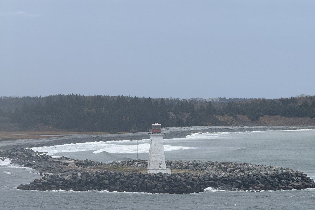 Waterfront and lighthouse view near Halifax during our October 2024 cruise
